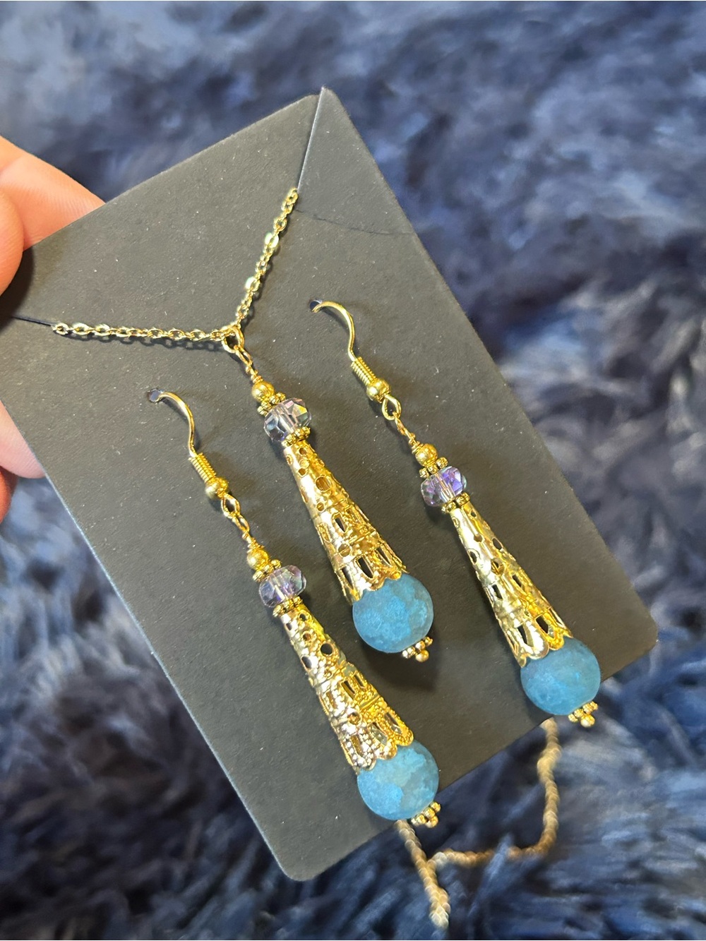 Handcrafted blue crackle glass gold filigree coil necklace and earring set